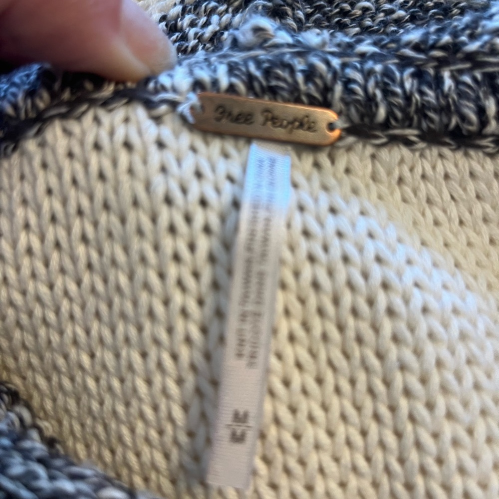 Free People cap sleeve full zip sweater.